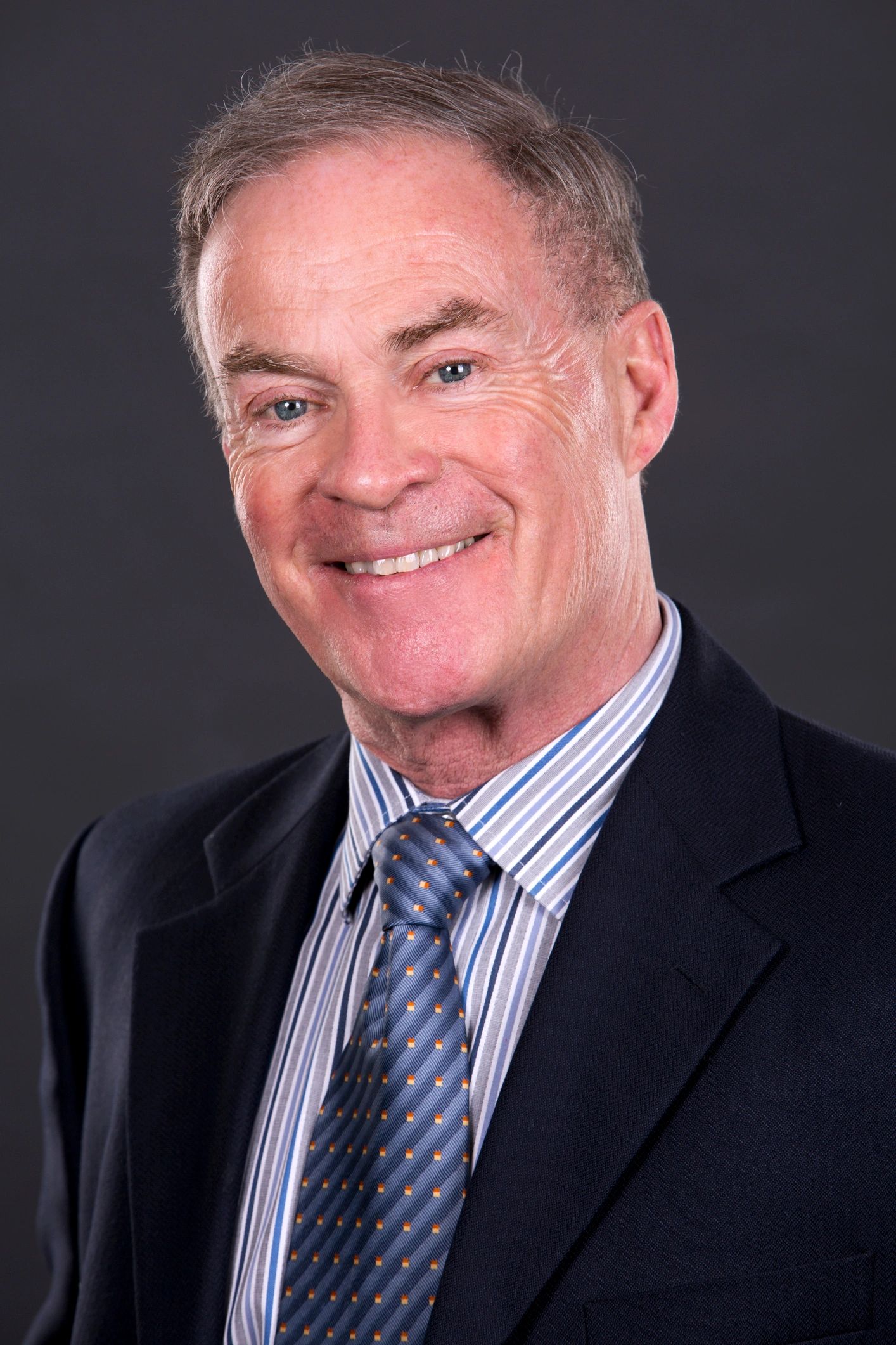 Executive portrait representing the strategy lead